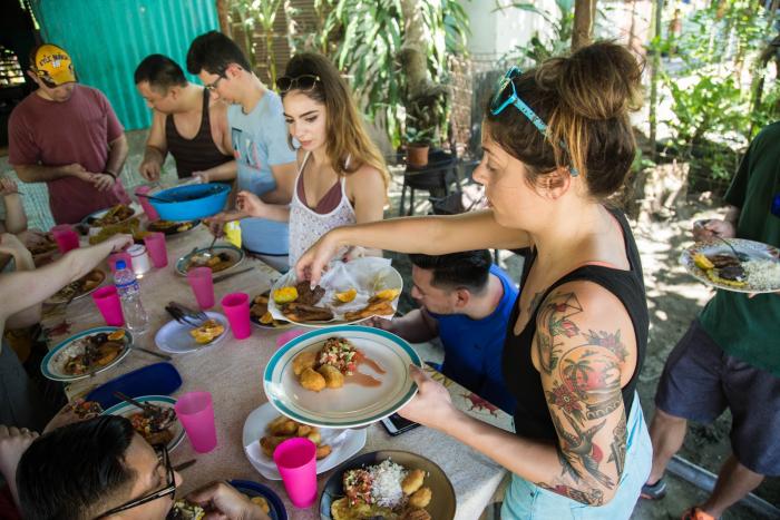 blog-How-We-Support-Sustainable-Tourism-in-Costa-Rica-sharing-a-meal.jpg