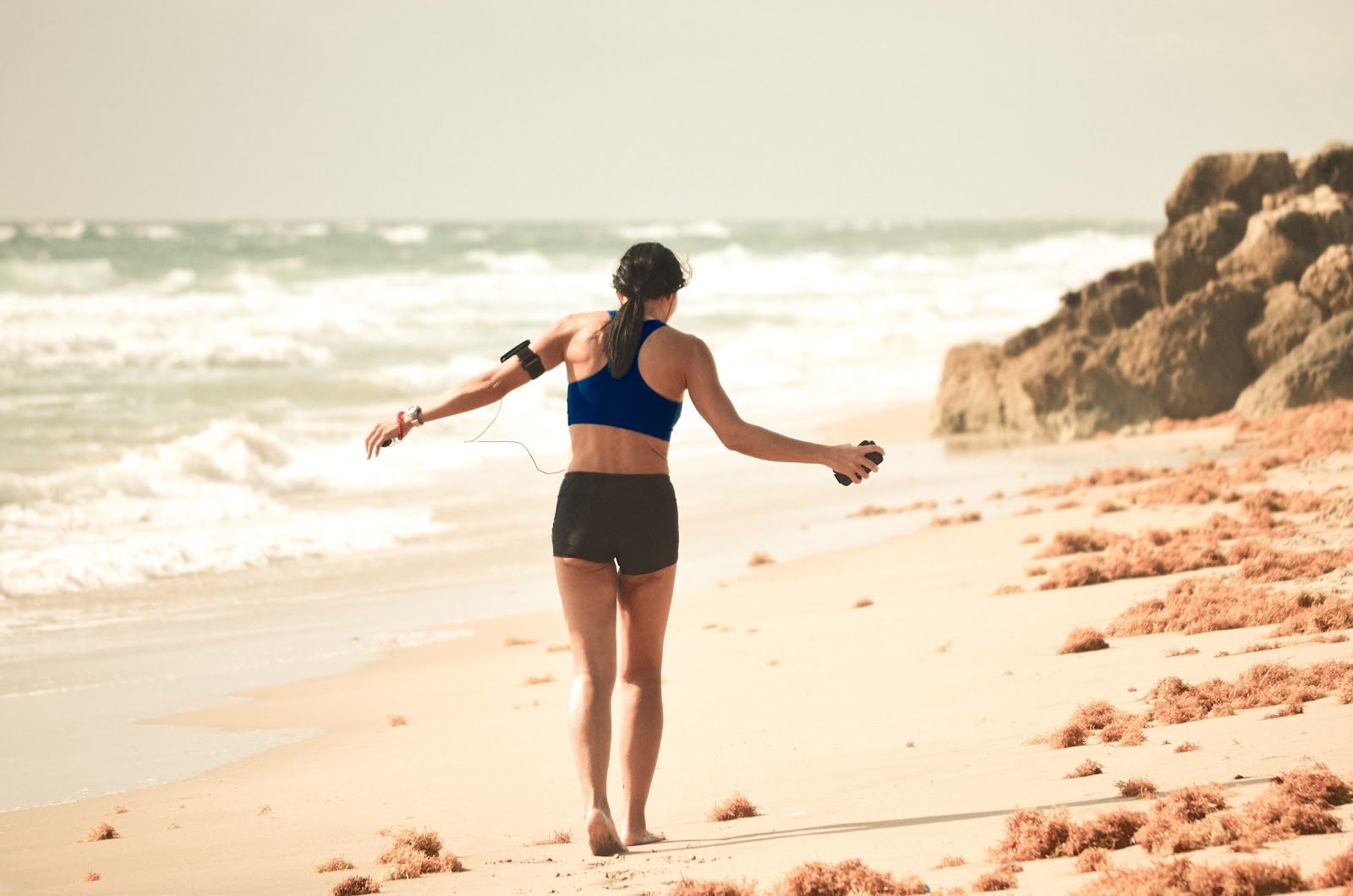 female-working-out-on-beach