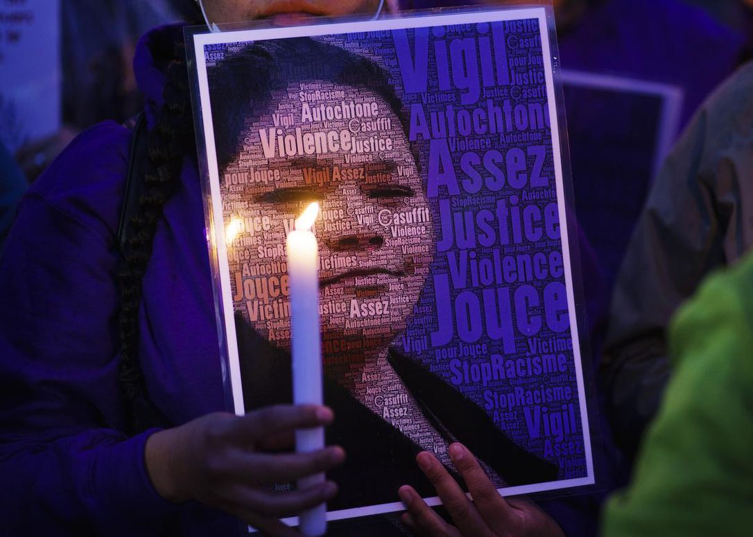 A woman attends a vigil in front of the hospital where Joyce Echaquan died in Joliette, Que. on Sept. 29. A nurse was fired after Echaquan, an Indigenous woman, who was dying Monday night in hospital was subjected to degrading remarks.
