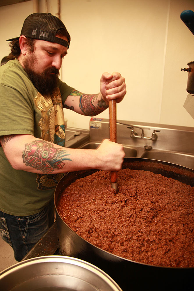 One of Jim's Coney Island's customers comes in from Arizona, picks up 10 pints of chili, and then goes back to Arizona. (Photo: Marc Rains)