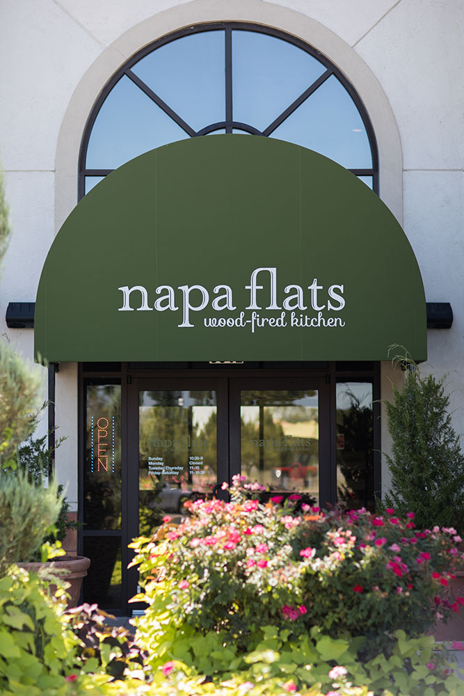 At Napa Flats, high ceilings, hanging lights, and walls lined with windows create a casual and peaceful hideaway from the stress of your life. (Photo: Valerie Grant)