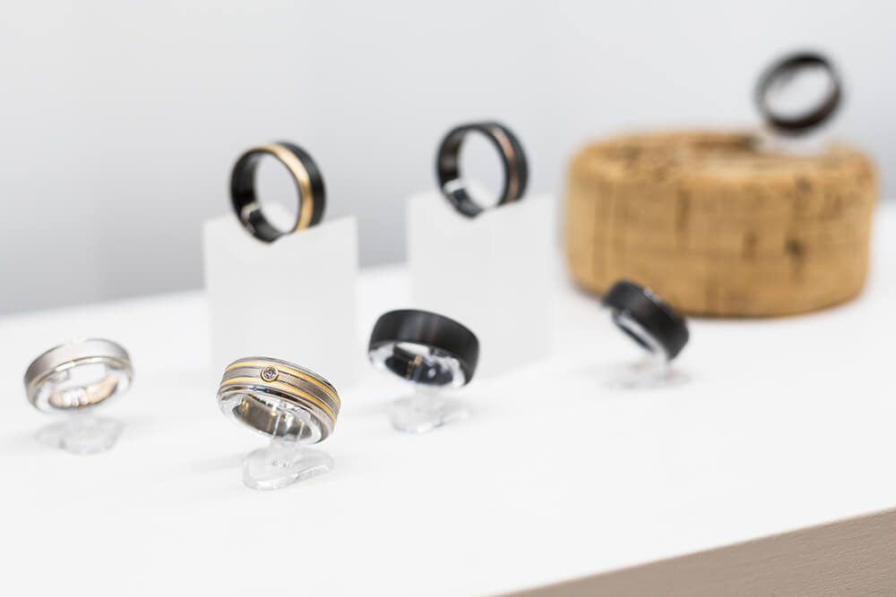 One of Spexton’s specialties is their hand-crafted, contemporary-style wedding rings, made from materials like titanium, black zirconium, stainless steel, cobalt, meteorite and wood. (Photo: Valerie Grant)