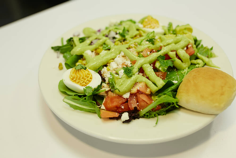 In terms of lunch, Kitch offers fresh menu items such as pork or smoked chicken ranchero street tacos, banh mi, Reubens, muffulettas, tortilla soup, a power bowl salad, and a blue cheese wedge salad. (Photo: Sarah Eliza Roberts)