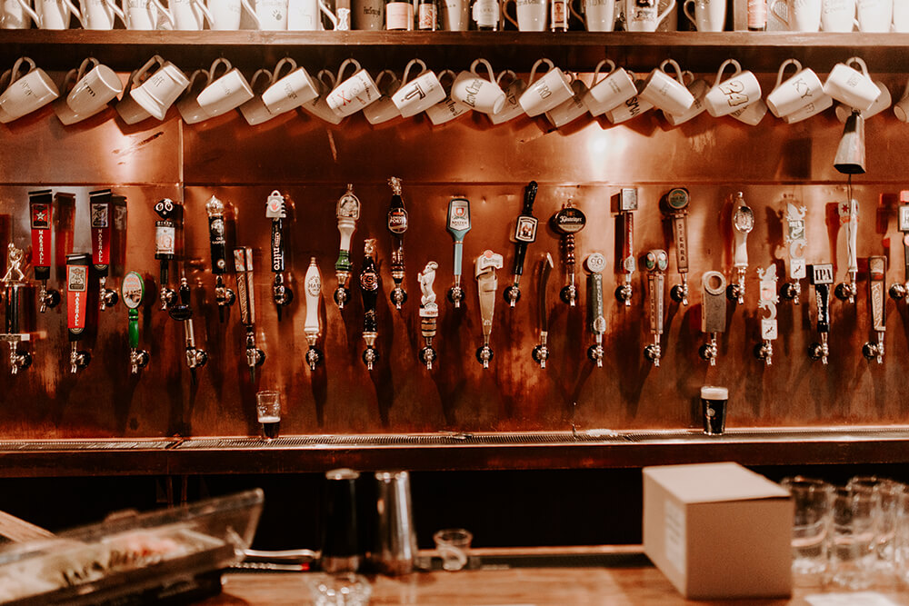 The bar with 72 taps lets you know you have all the time in the world to explore McNellie’s beer menu. (Photo: Sarah Eliza Roberts)