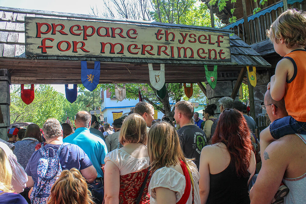 Upon entering the gates, you will be greeted with bantering from jokers, kind welcomes from street vendors and an array of costumes in every color of the rainbow.