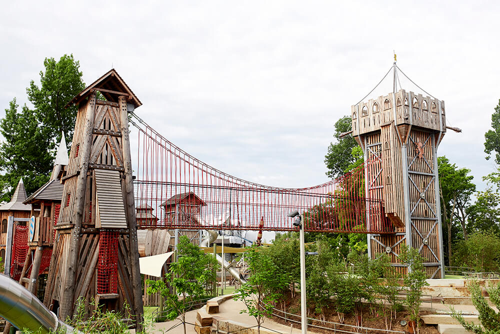 At the Gathering Place, over 60 acres of attractions, including slides, towers, climbing features, water areas, play gardens and sandlots provide more than enough for the kids to explore, exercise, and have a great time.