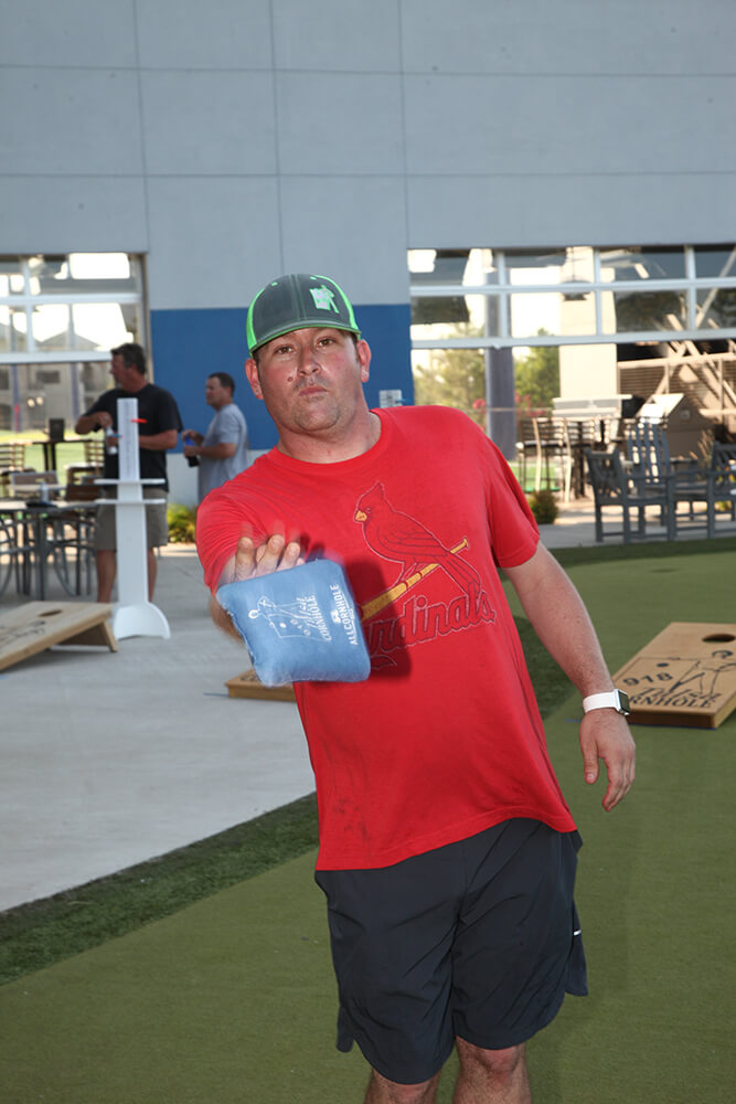 While the local cornhole scene in Tulsa is gradually increasing in popularity, Jason Strickland, a U.S. Air Force veteran, points out he is not ready to quit his day job. (Photo: Marc Rains)