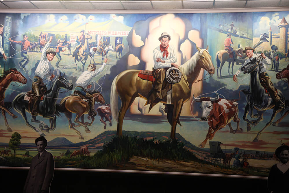 The first room, the west gallery, is a stunning collection of paintings, sculpture, and several displays from Rogers’ extensive collection of saddles. (Photo: Marc Rains)