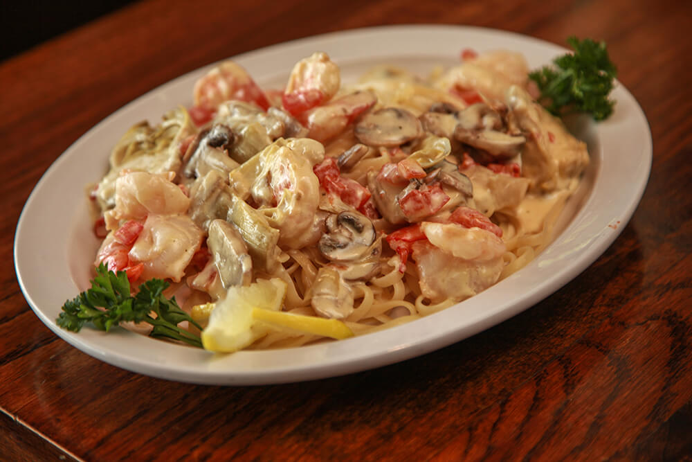Does it get any better than feeling like you just sat down to an authentic Italian dinner on the Lower West Side of New York City? At Mondo’s family-run restaurant, that’s pretty much what you get in Tulsa’s “Lower” Brookside on Peoria.
