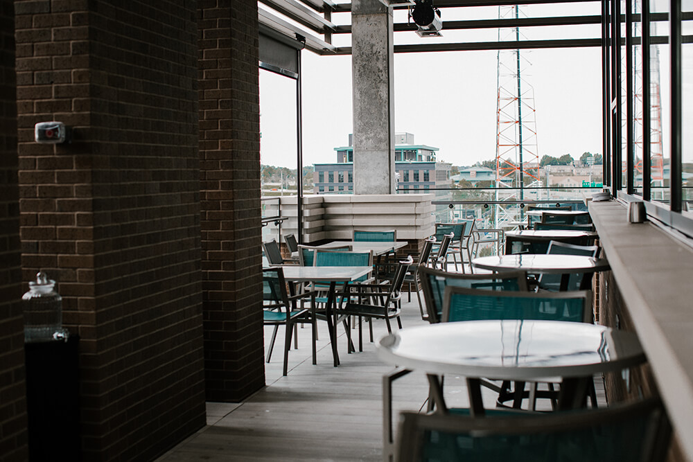 It’s easy to see why the spot is so popular. The bar has a fantastic view directly north toward ONEOK Field. There’s also a great view west toward the most iconic buildings in downtown Tulsa — the Philtower, Williams Tower, and other beautiful examples of Tulsa’s architecture. You can also see south toward Hillcrest. The spot is ideal for gazing at sunsets. (Photo: Sarah Eliza Roberts)
