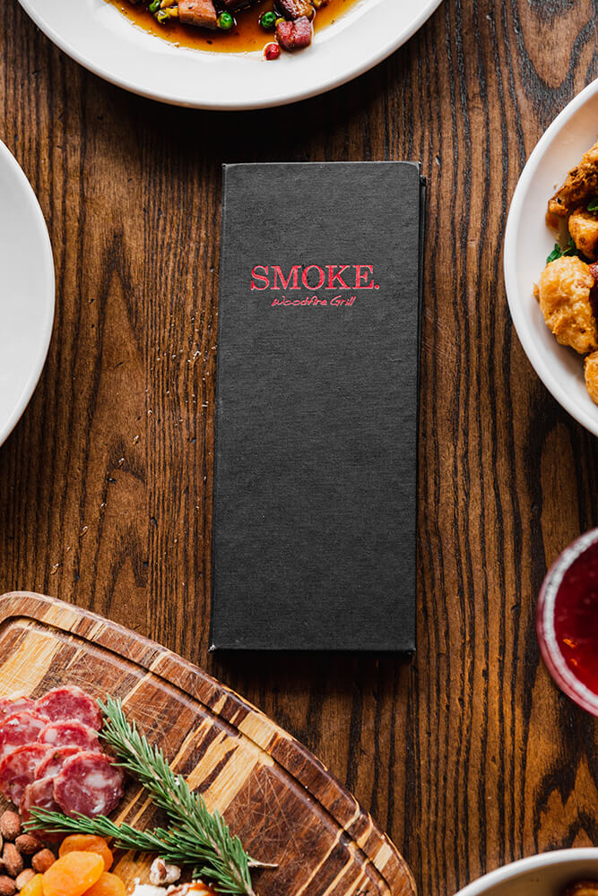 SMOKE. takes its name from the woodfire grill and the wood smoker used to make their bacon. That woody, smoky flavor kisses all the proteins during their time over the flame. (Photo: Sarah Eliza Roberts)