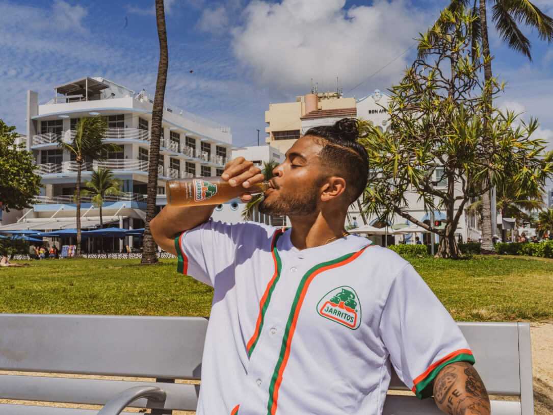 Jarritos brand ambassador drinking soda