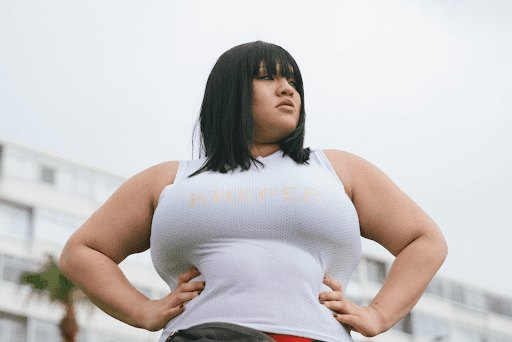 A plus-size woman with black hair