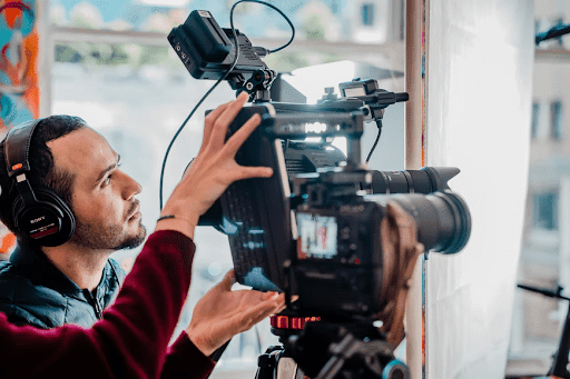 a videographer using a video camera