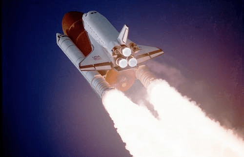 A rocket hurtling toward space to signify upselling techniques.