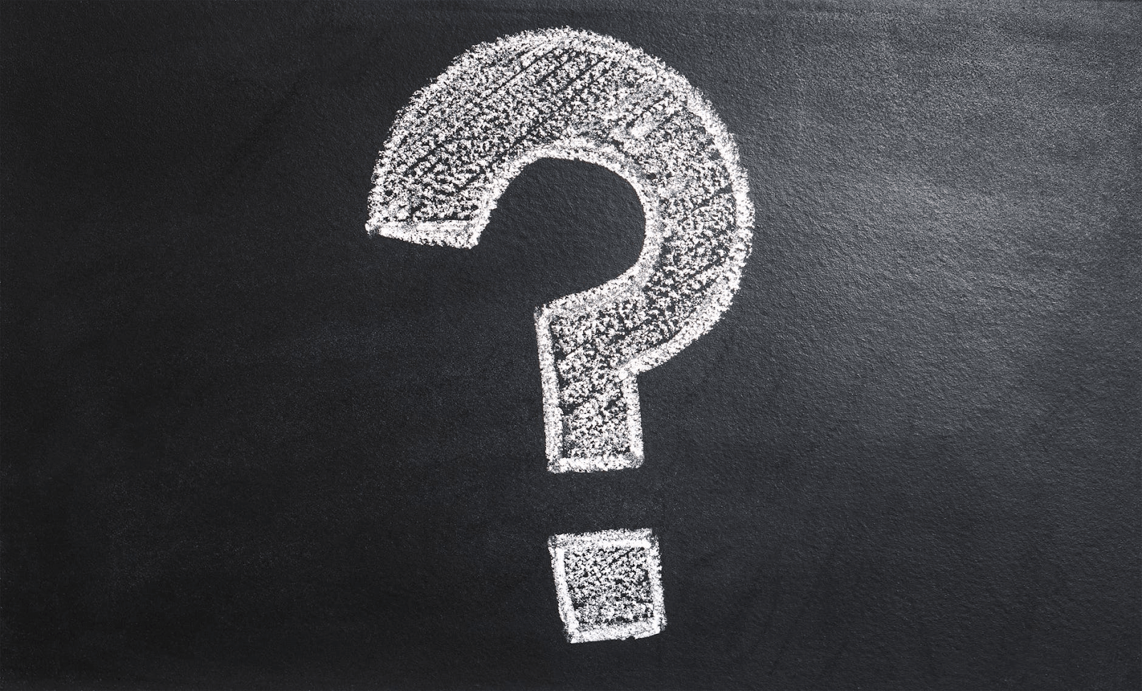 A Chalkboard with a question mark drawn in chalk.