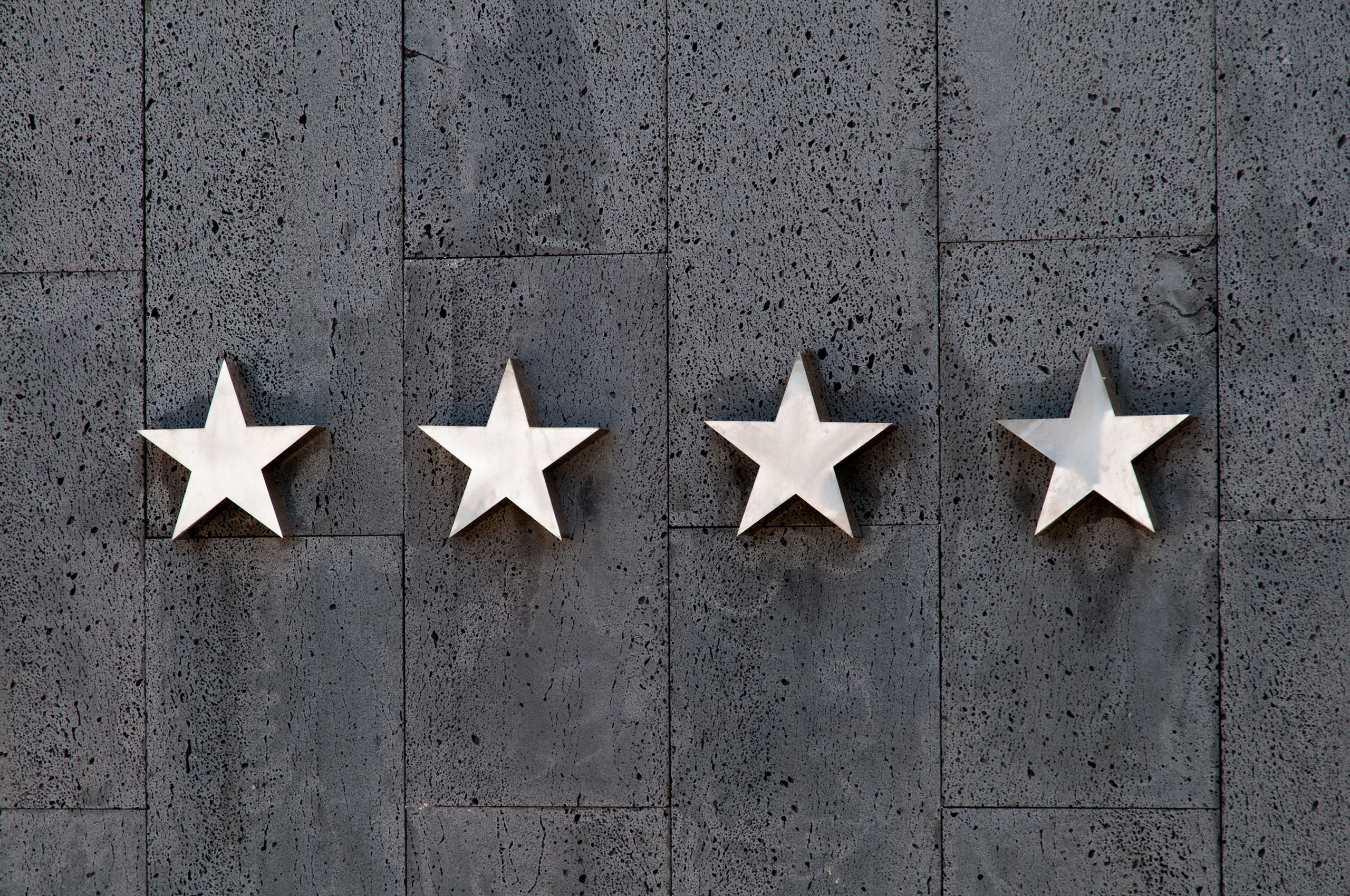 Wall with four stars