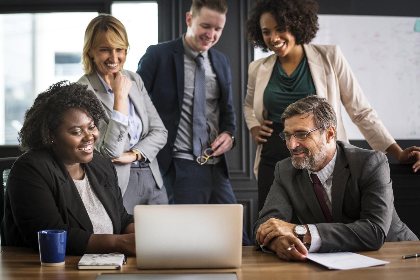 business people laugh at a personalized inbound marketing video