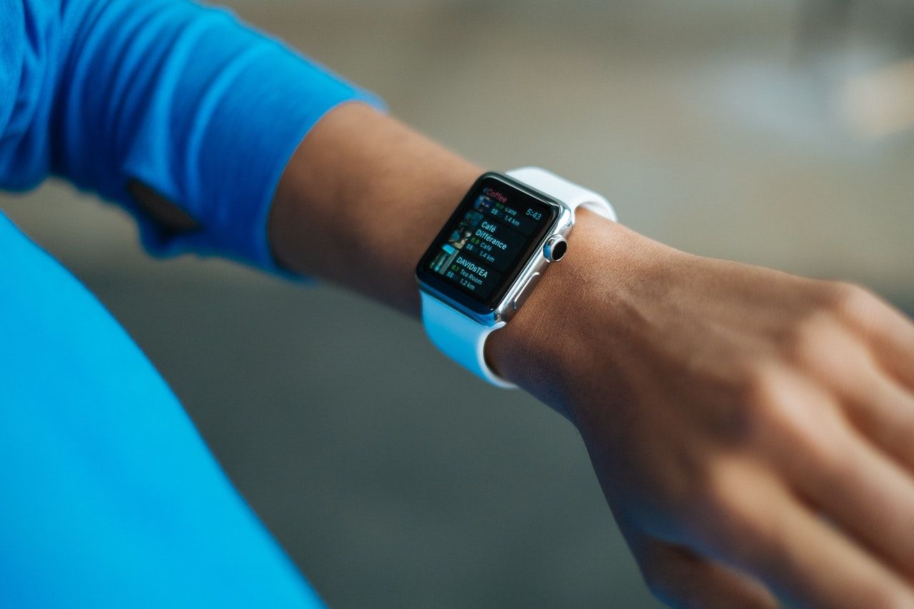 close up of a wrist with a smart watch