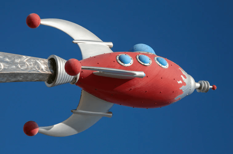 Red and silver rocketship statue.