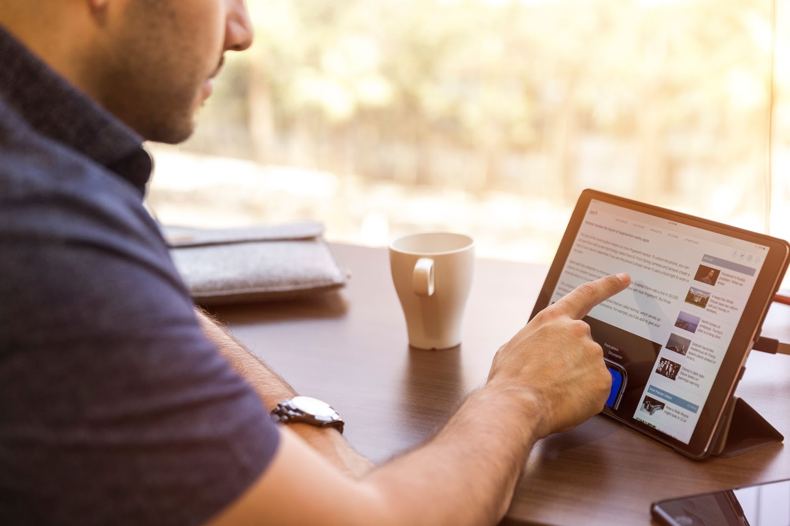 man using tablet