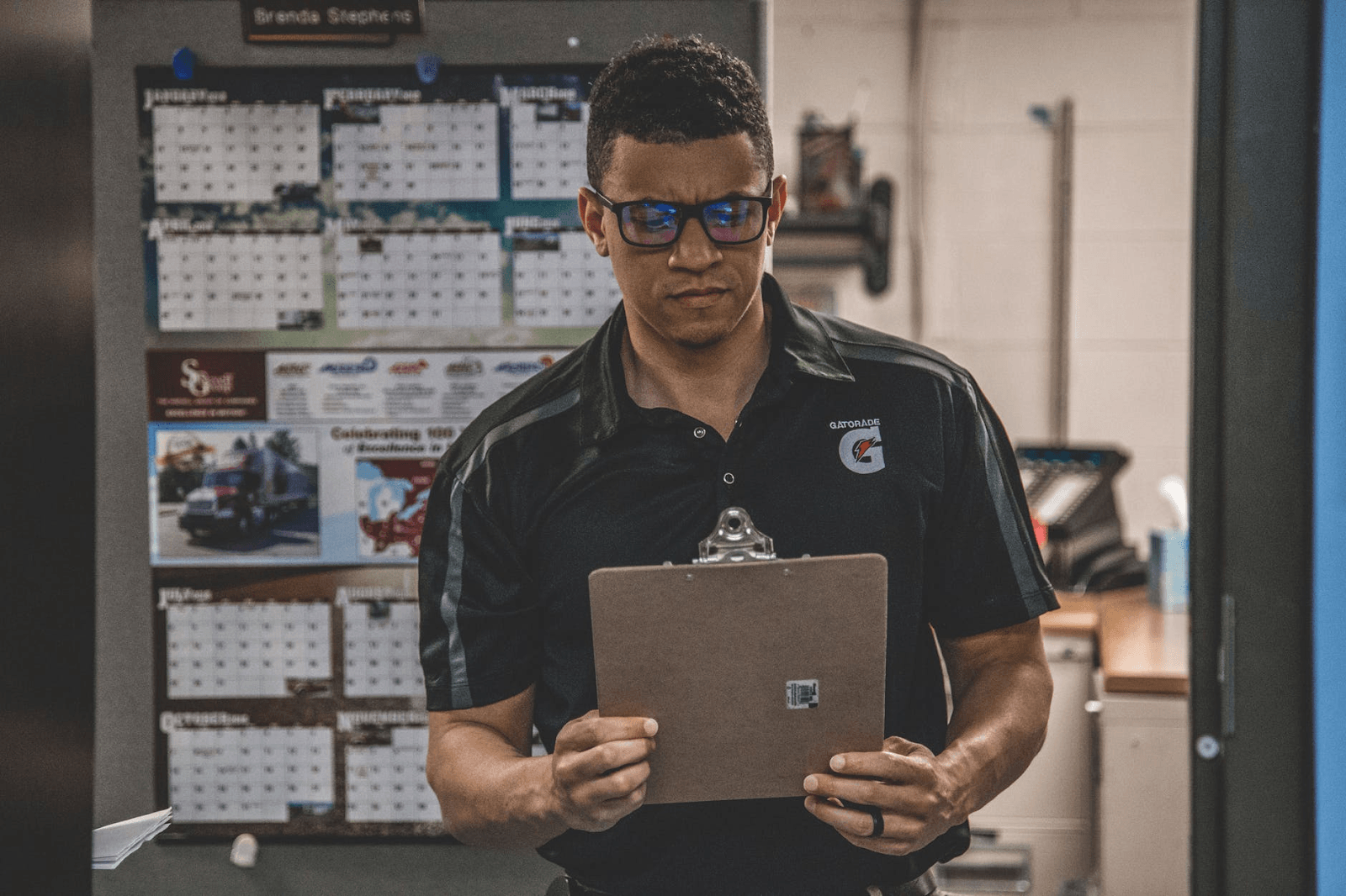 A man with a clipboard.