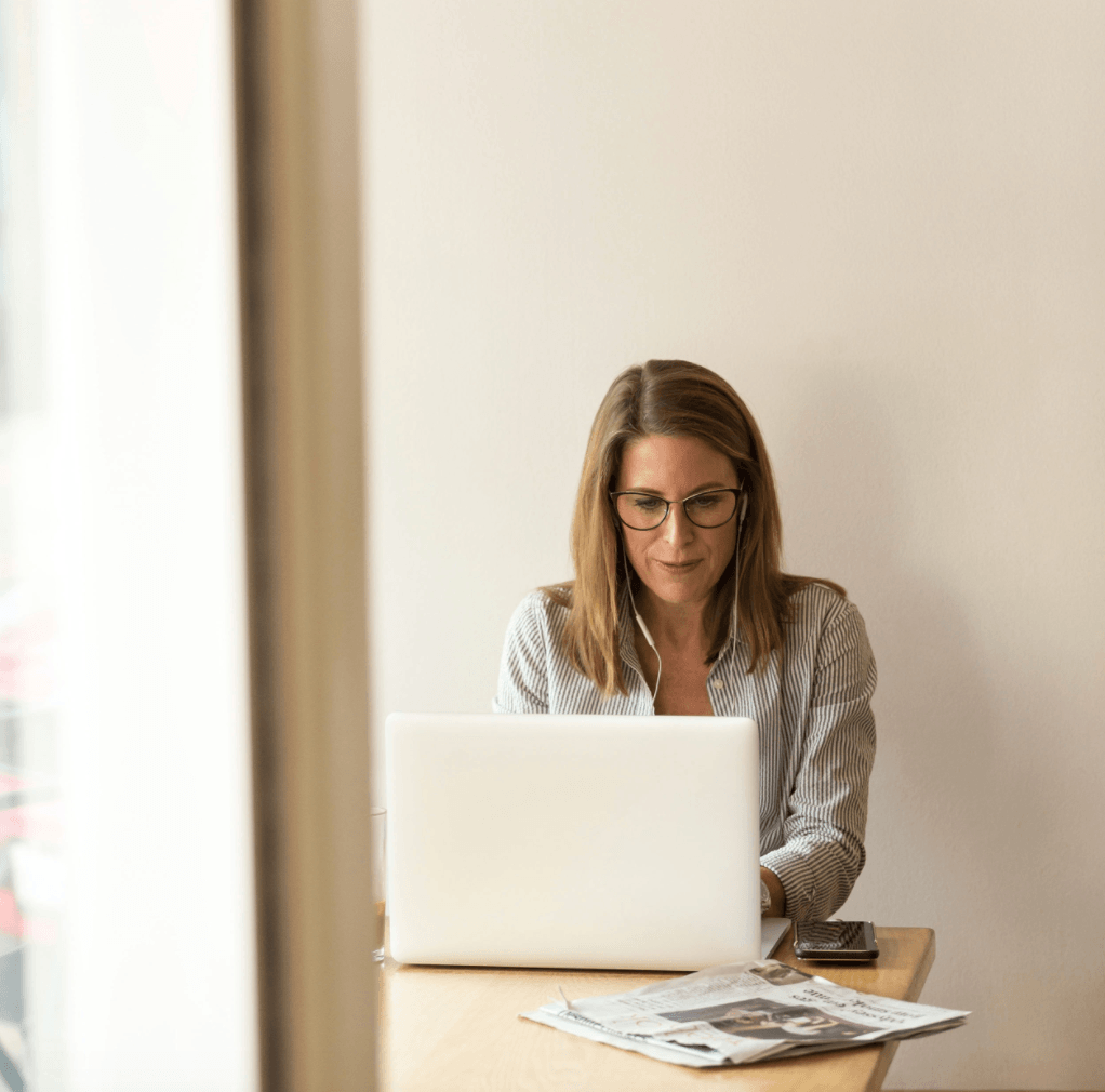 woman focusing on a laptop
