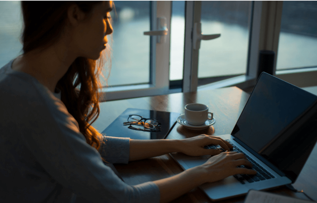 woman focusing on a laptop