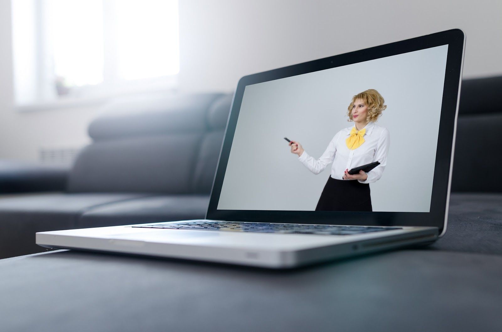 Remote candidate presenting on laptop
