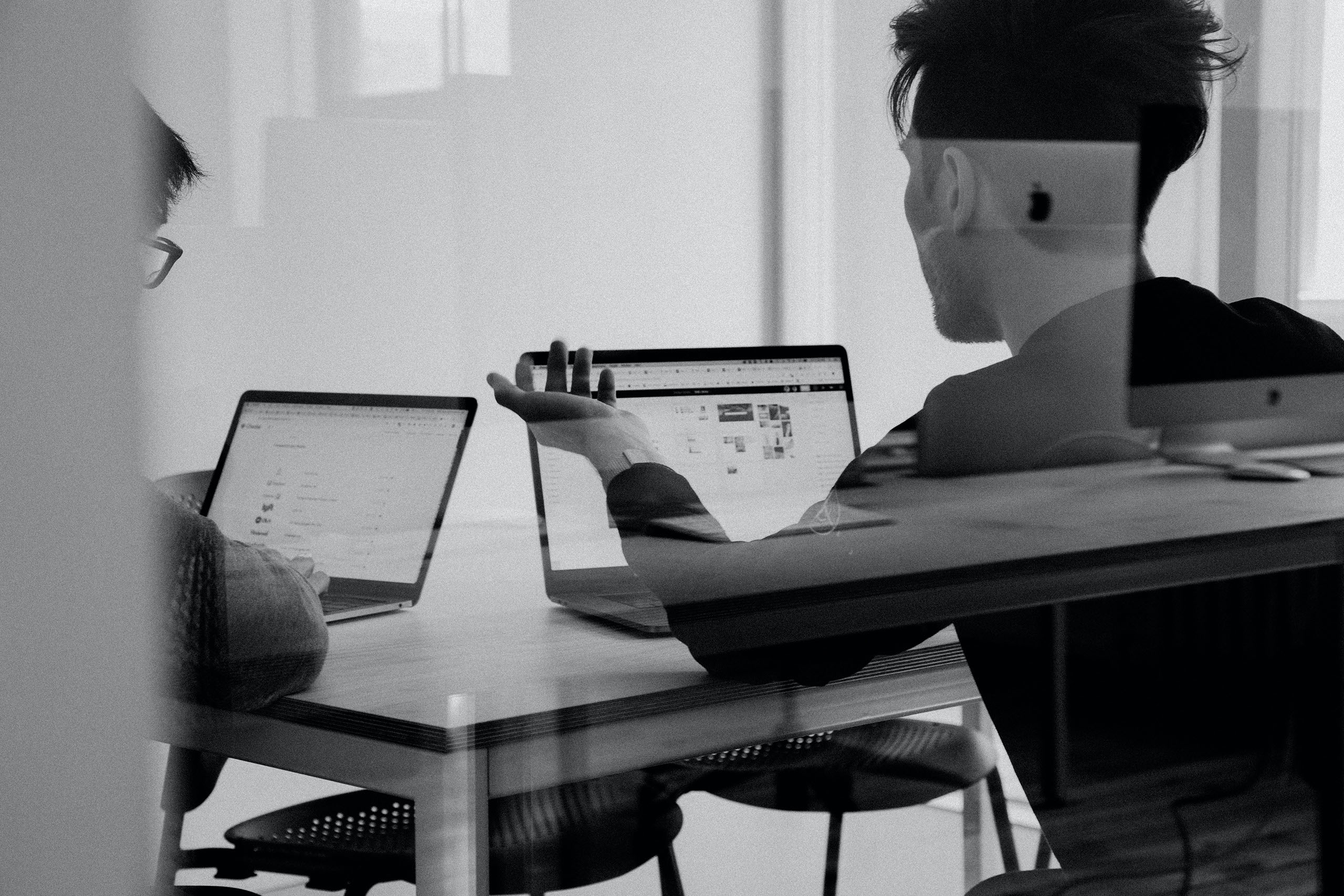 two employees in a meeting