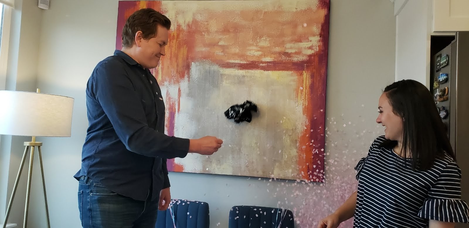 screenshot of gender reveal balloon popping