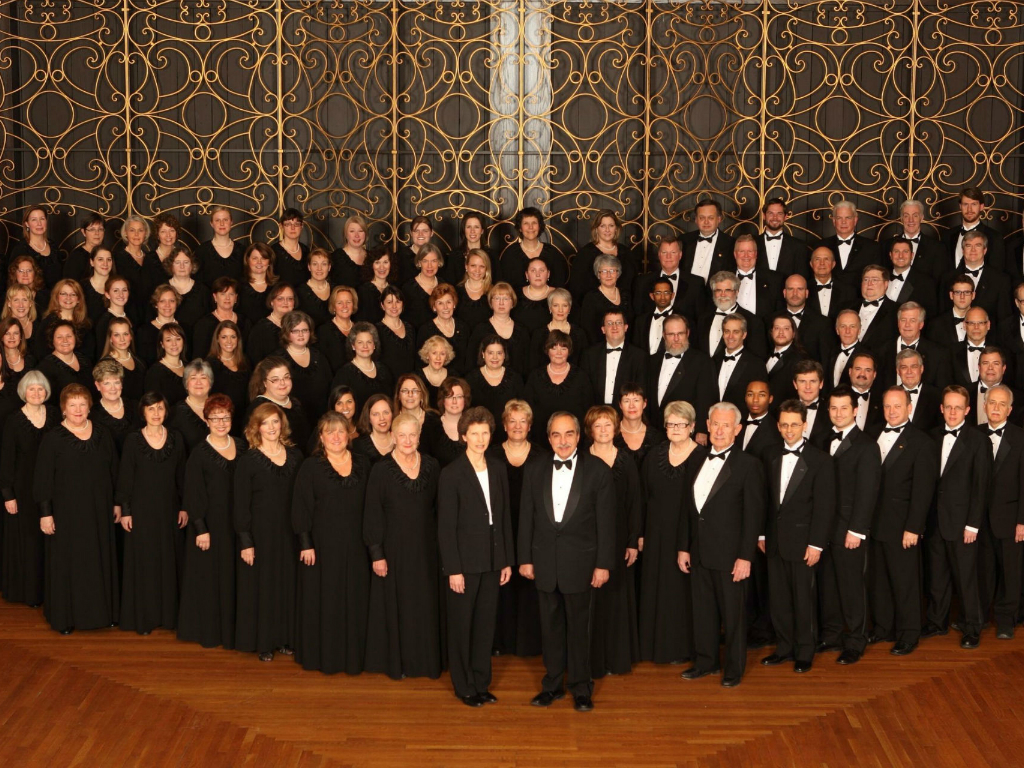 a choir in dress attire gathers to sing in cincinnati ohio