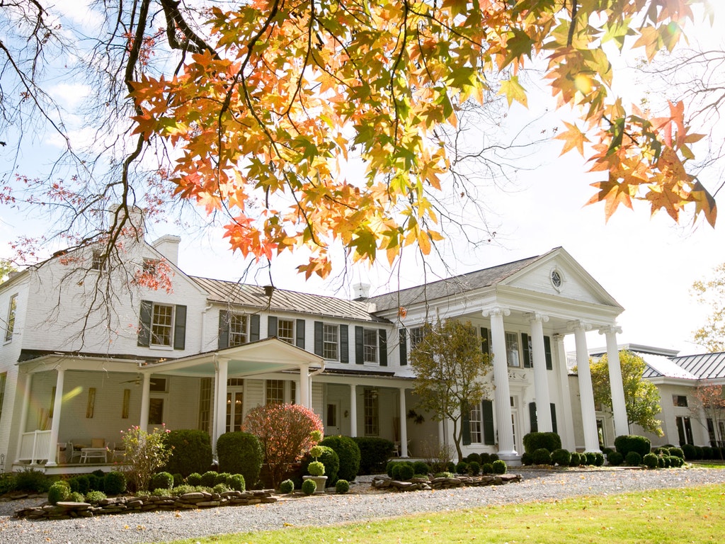 a large home with an attractive lawn