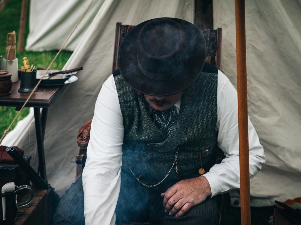 a man in old fashioned clothes at historic roscoe village