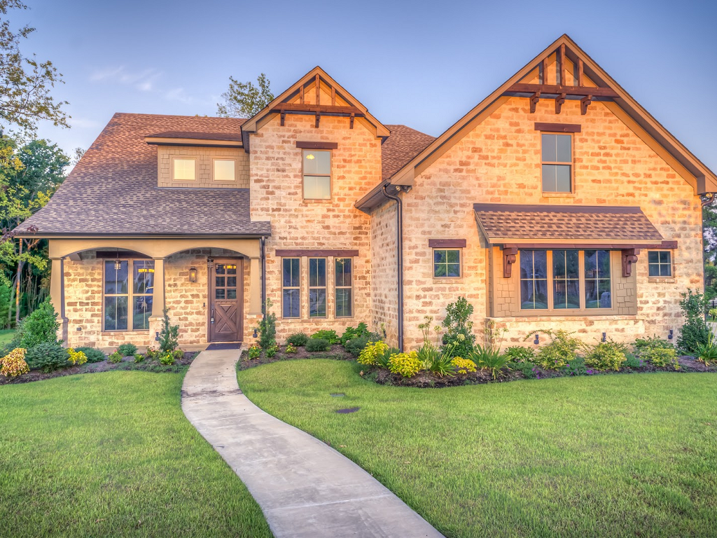 an orange brick home for sale