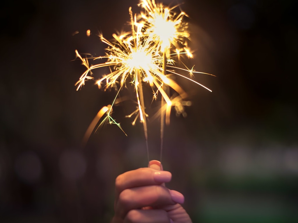 person holding a sparkler