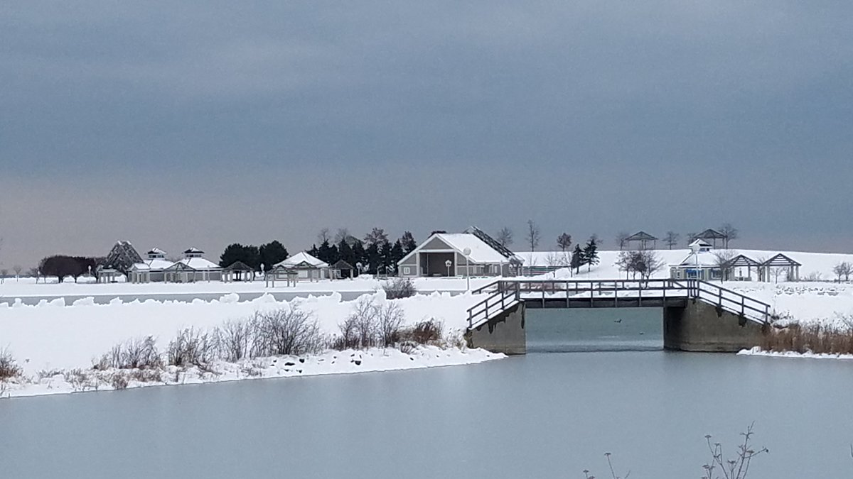 snowy town and bridge