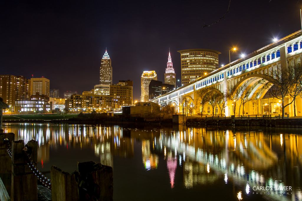 cleveland's holiday lights reflected in the water