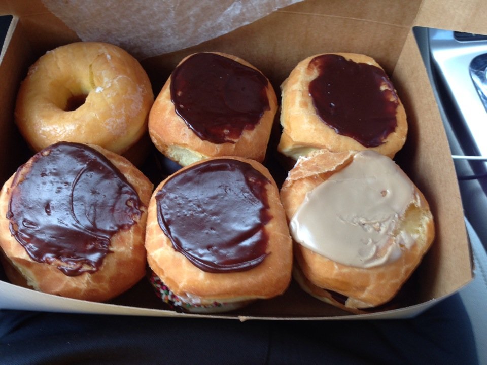 box of glazed, iced, & filled donuts at Yum-ee in Sunbury