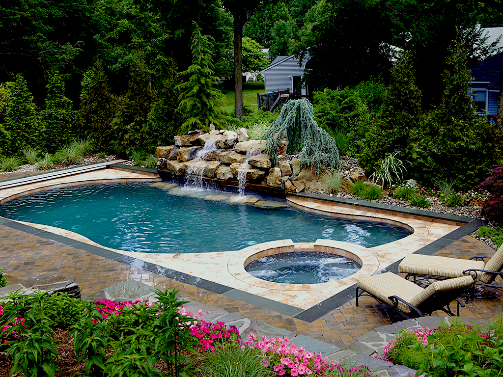 modern pool and hot tub sanctuary with fountain