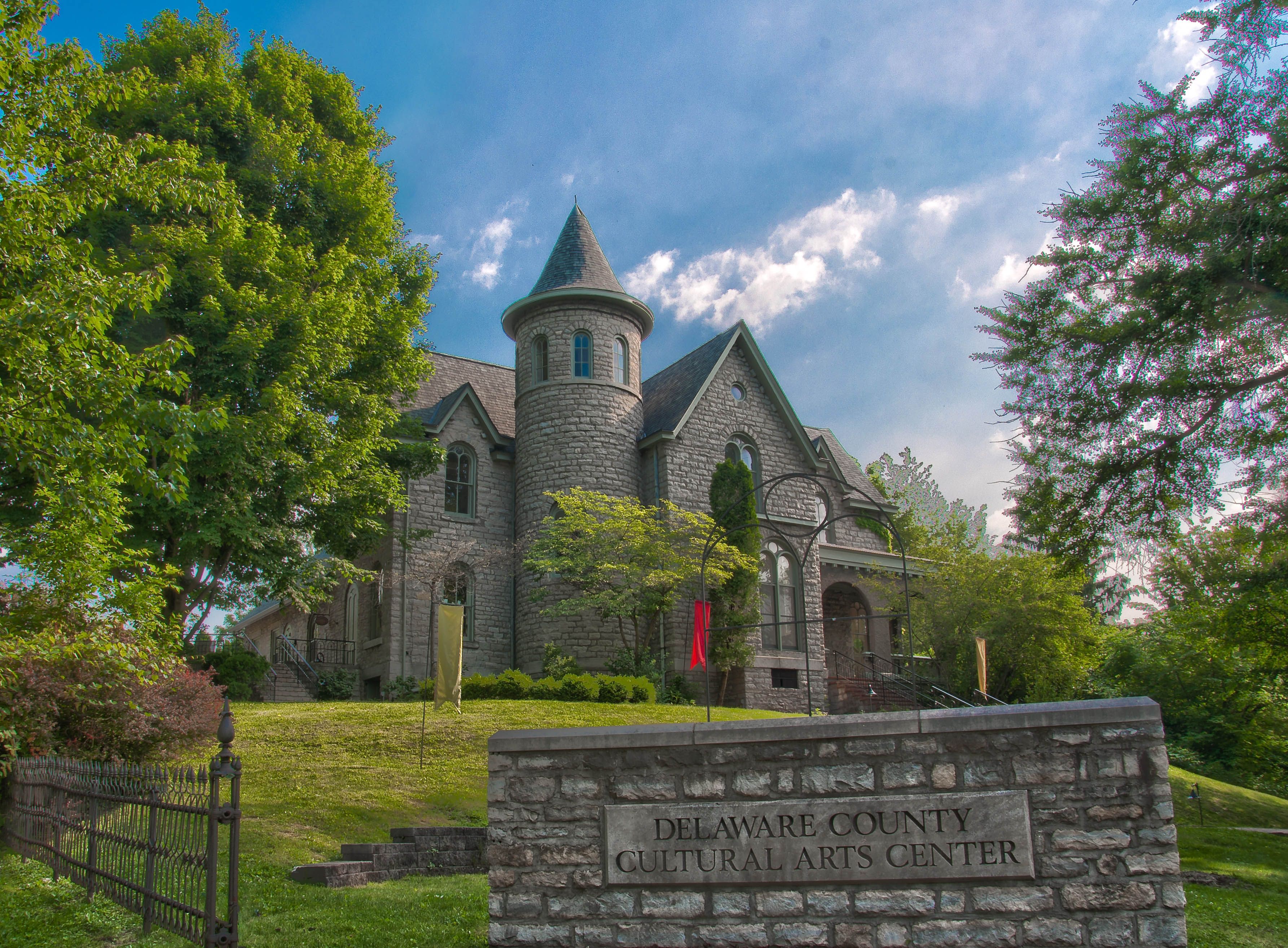 Delaware County Cultural Arts Center Castle with plaque in front