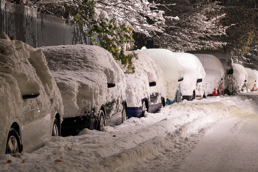 before the blizzard clearing car