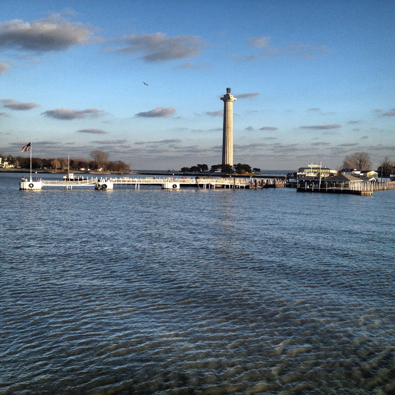 lighthouse, dock, and water of Put-in-Bay