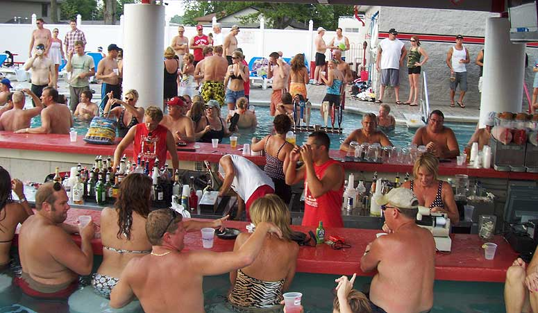 man people gather at Froggy's bar on Indian Lake