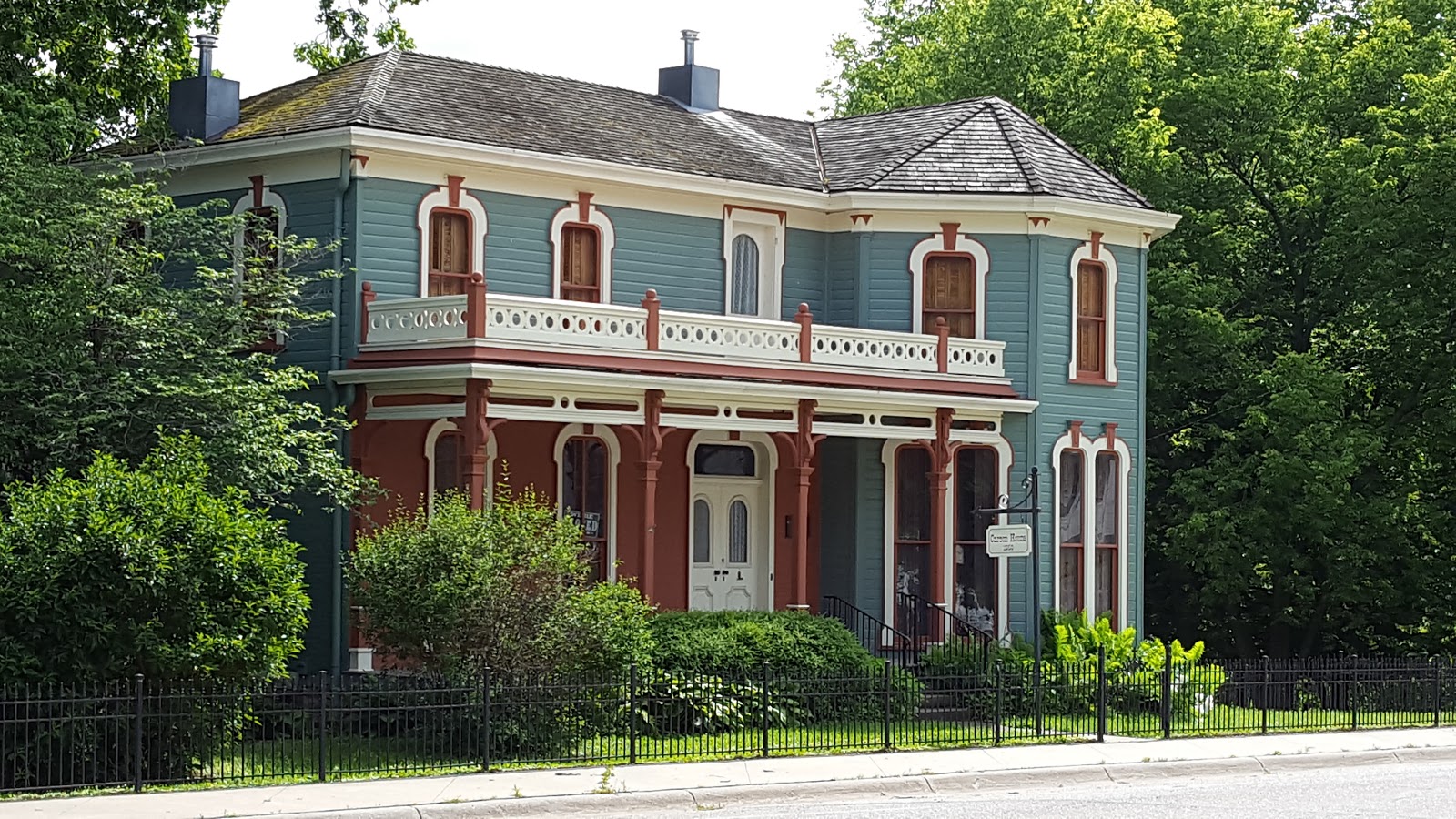 historic home surrounded by trees