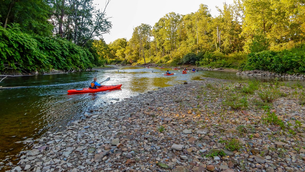 people canoeing down creek in Cuyahoga Valley National Park