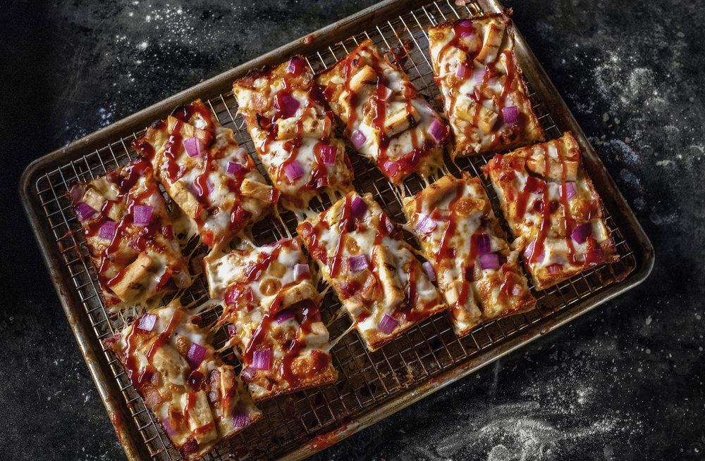 rectangular pizza slices with bbq sauce