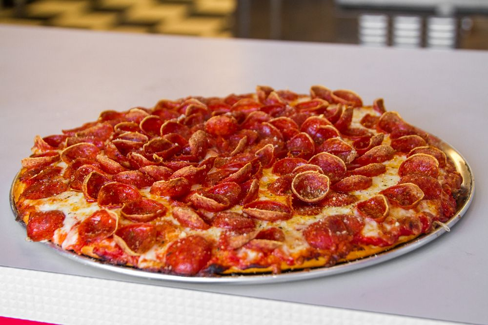 pizza with a lot of pepperoni