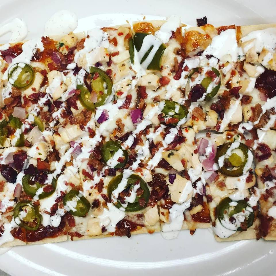 a pasta and chicken dish drizzled with ranch in a unique take on italian fare