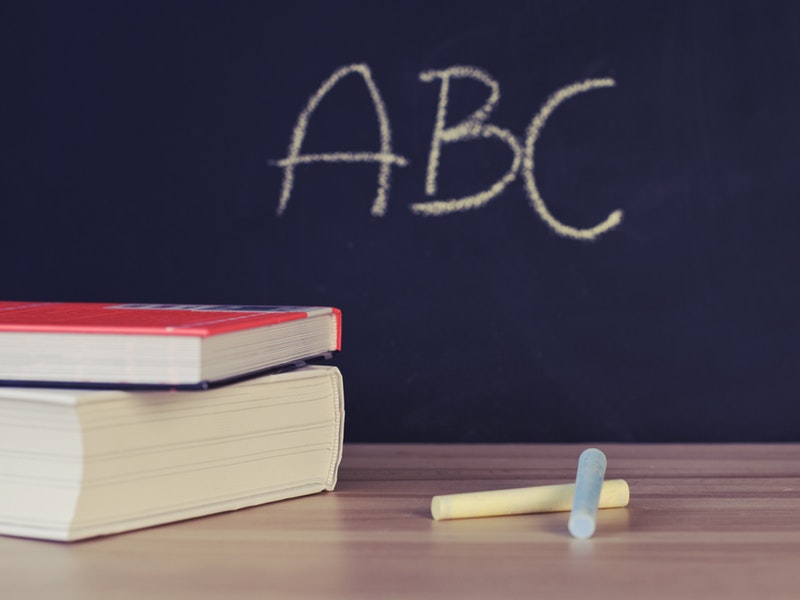 chalkboard and chalk and books